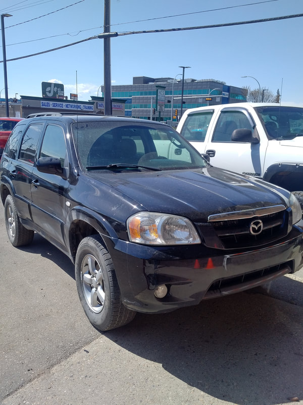 STOCK # BJ0006 FRESHish TRADE IN!        SOLD APRIL 2020

VIN: 4F2YZ92Z26KM37097

2006 MAZDA TRIBUTE ALL WHEEL DRIVE THIS BEAST DROVE UP FROM GRANDE PRAIRIE AND NEVER LEFT! 268,211KM ONCE IT HIT THE LOT.
TRUE STORY.... SENIOR OWNED FOR THE PAST 8 YEARS OR SO AND JUST WANTED A NEWER ONE. 2 CONTROL ARMS AND A WINDSHIELD AWAY FROM A PASSED INSPECTION. 4 CYLINDER AND PRICED AT $2000 which breaks it down to $1904.76 plus $95.24 on the tax. THESE PARTS CAN BE REPLACED AND A PASSED INSPECTION ISSUED. IF YA DON'T ASK YA DON'T GET. LET'S DEAL! FULL DISCLOSURE ON THIS MOFO right on the included inspection form.