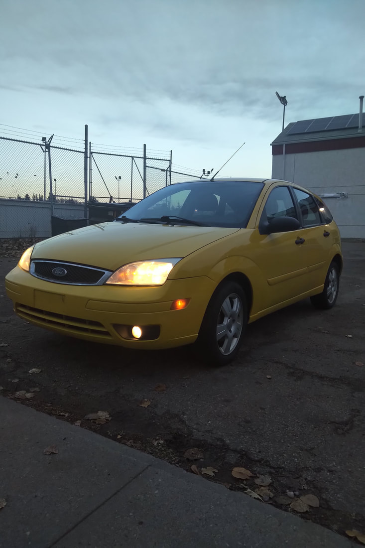 stock # bj0011
2007 ford focus ses "with the backhatch" is the lingo.
206,803km
VIN: 1FAFP37N17W224951
$2650 all in cost means $2523.81 plus $126.19 gst

Leather guts and ass warmers that work and the full load for a focus automatic. it's "an iser for cheeper" currently for now and final presale repairs can be arranged and the quote is available by request. we will not "just pass it for a case o beer." what ya see is what ya get and clean inside and out is what it is. The car needs....tires: tHey are round, hold air and don't vibrate. 205 50 16's. They are guaranteed to take you into the ditch on a bad winter day.
rear trailing arm bushings. they are simply worn out and gotta be replaced. this also means alignment. Finally the windshield has a crack that will not pass inspection. The car is far from a loser but ya needa know whassup before you come visit!  CARFAX PIC ATTACHED 